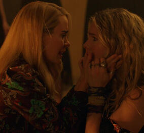 Misty and Cordelia from AHS Apocalypse, Season 8 Episode 5. Cordelia holds misty's face lovingly